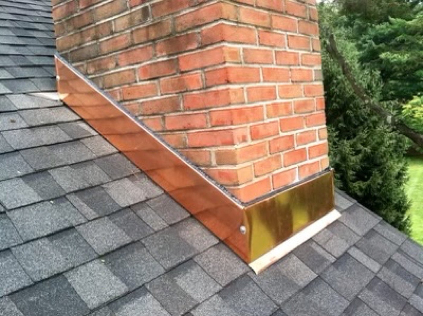 New chimney flashing installation to stop roof leaks — Shelby Roofing Services Blue Bell PA