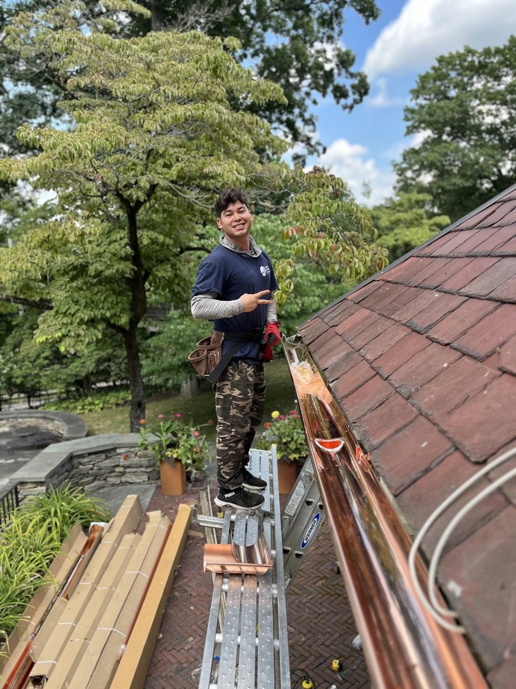 Professional gutter installation on residential home — Shelby Roofing Services PA