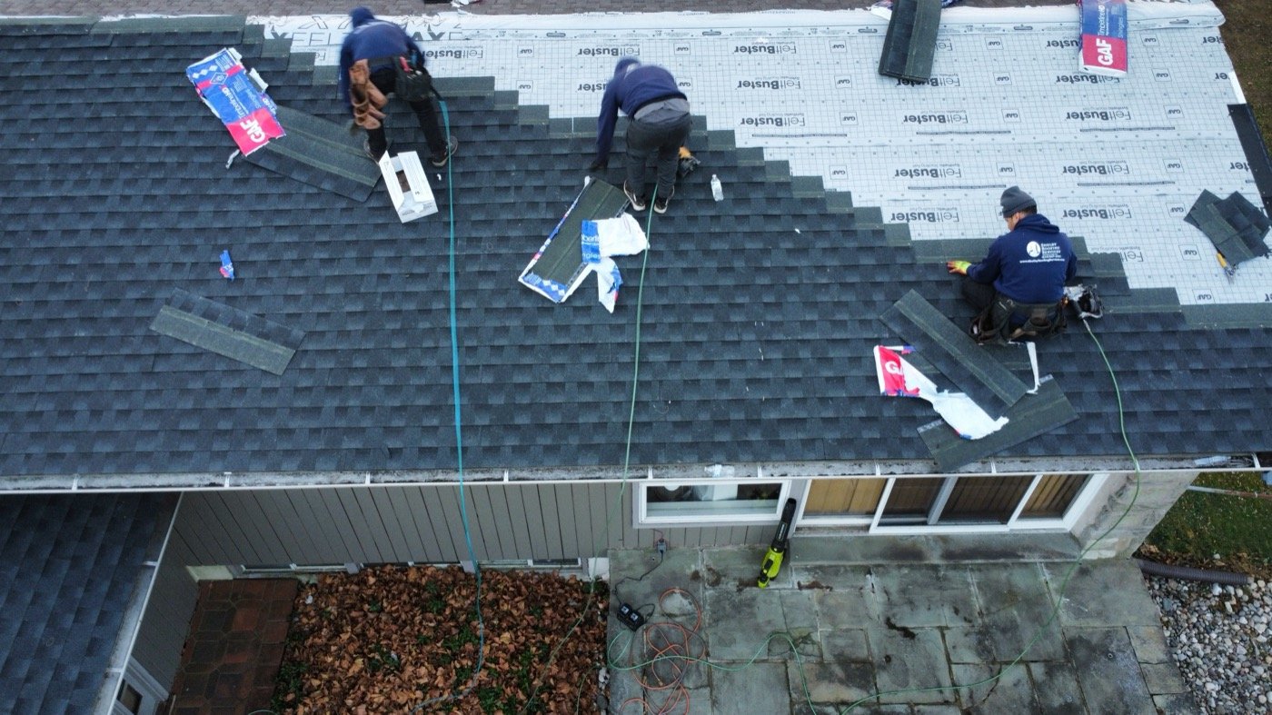 Shelby Roofing Services crew installing architectural shingle roofing in Montgomery County PA