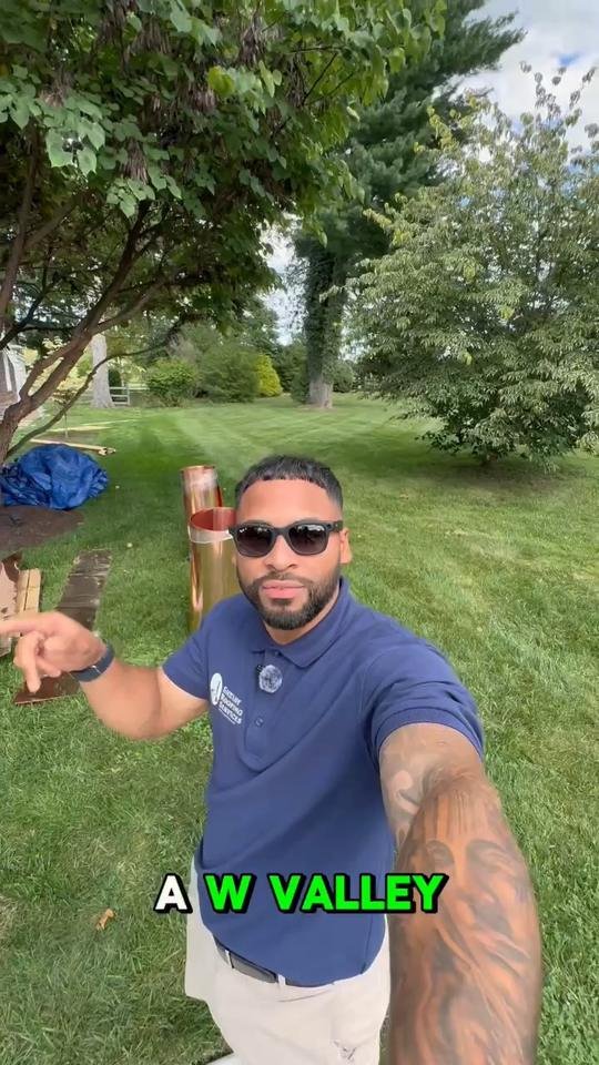 Miguel Cespedes with a hand-formed copper W-valley on a job site, Shelby Roofing Services video
