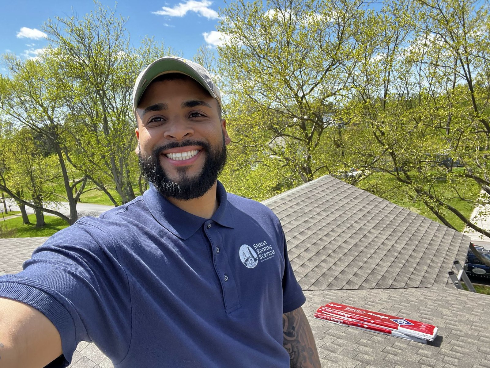 Miguel Cespedes smiling on an active roofing job site — project in progress, Greater Philadelphia Area