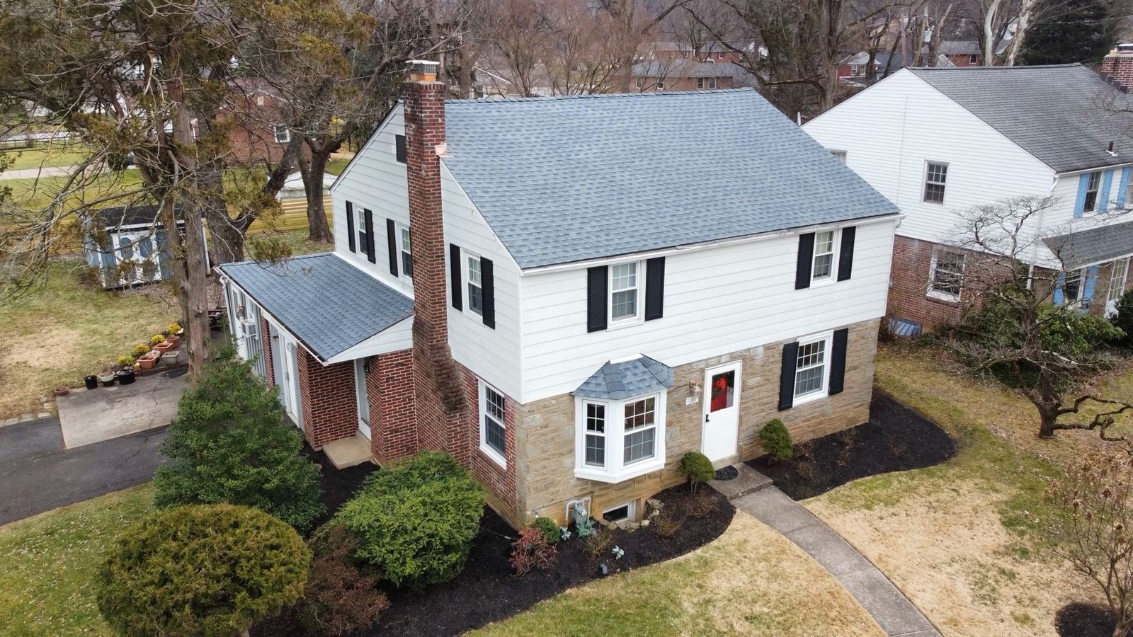 After — front aerial view of completed shingle replacement with new architectural shingles — Shelby Roofing Services PA