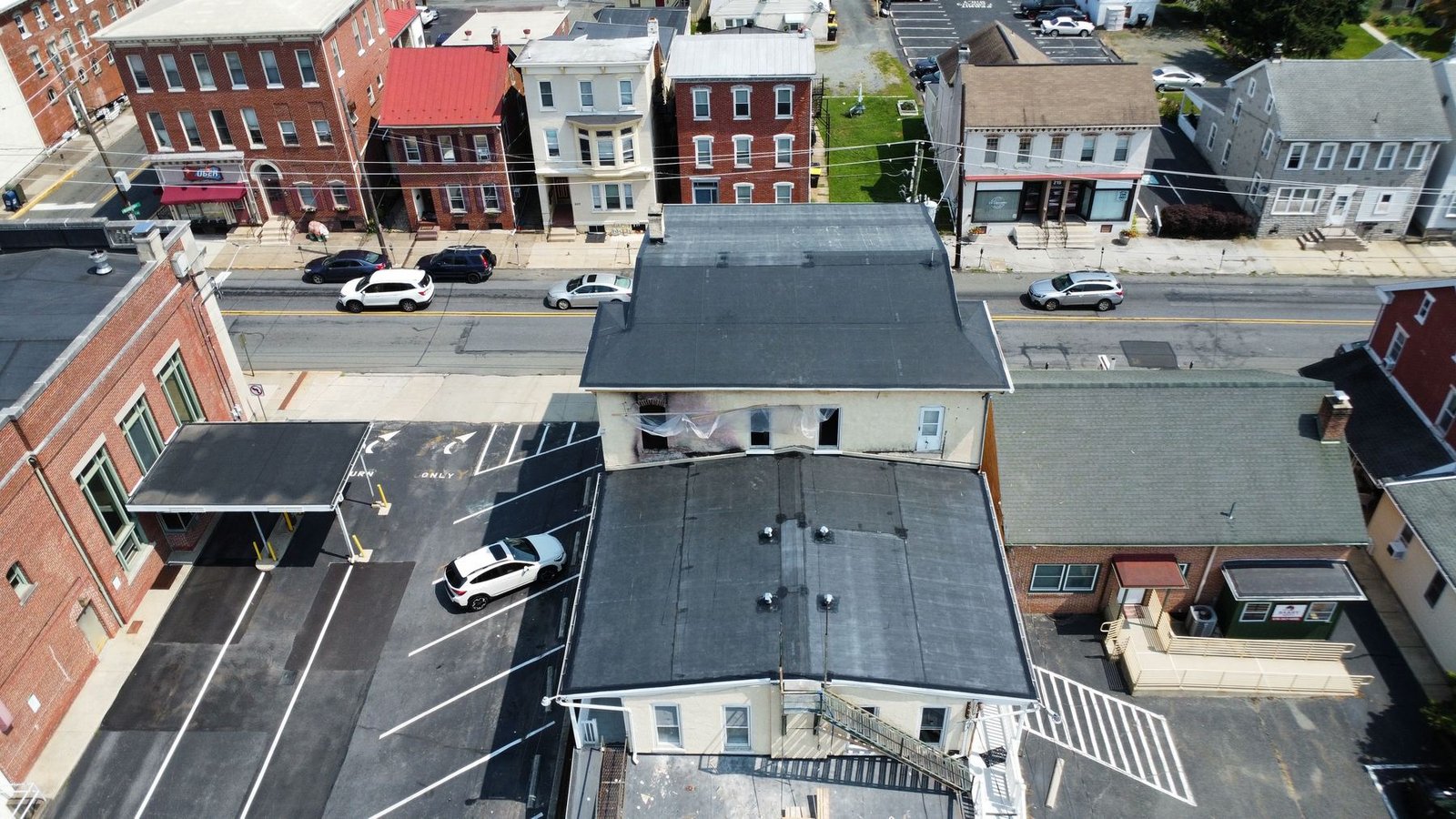 After — aerial top-down showing completed new EPDM flat roof on commercial building — Shelby Roofing Services PA