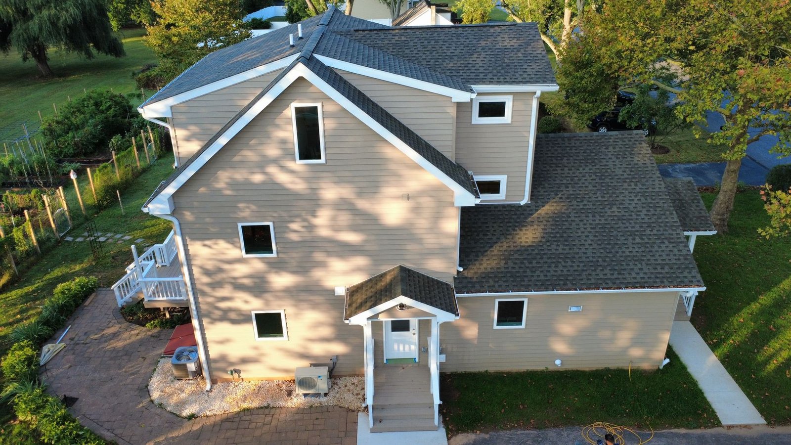 After — rear aerial of expanded home — Shelby Roofing Services PA