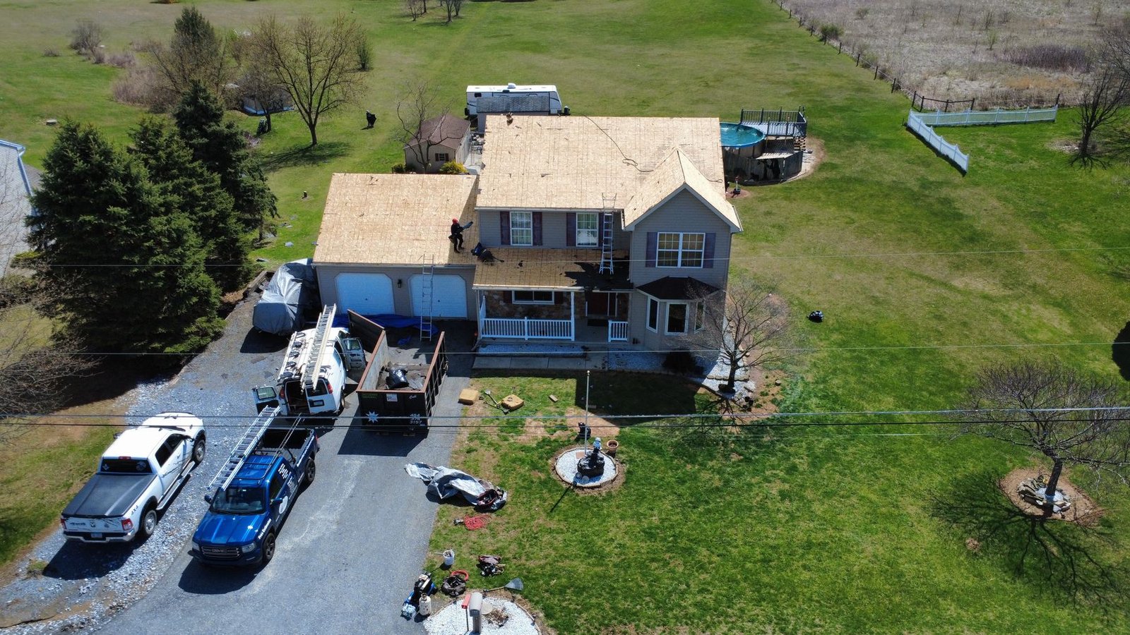 In-progress — shingle installation on 2-story colonial farmhouse, PA