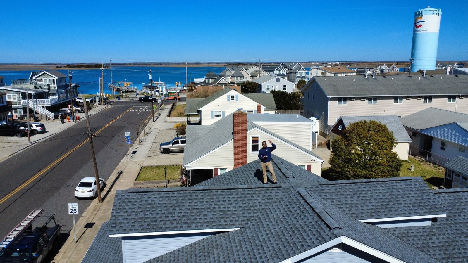After — wide aerial of completed Cape Cod — Shelby Roofing Services NJ