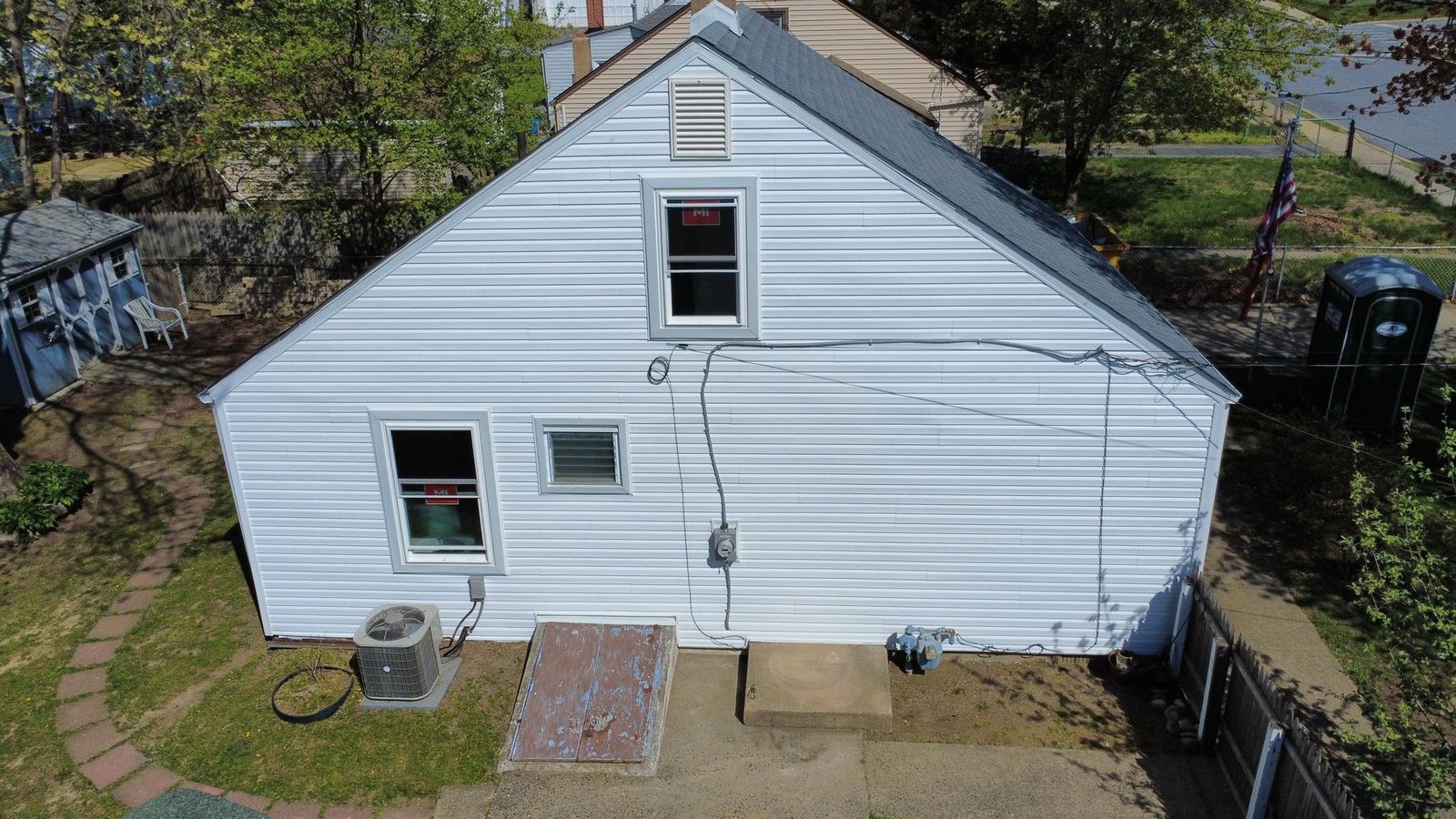 After — top-down aerial of completed Cape Cod bungalow — Shelby Roofing Services NJ