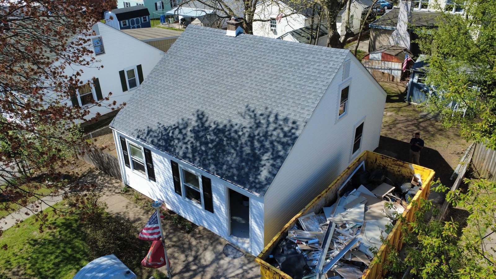 After — wide aerial of completed Cape Cod — Shelby Roofing Services NJ