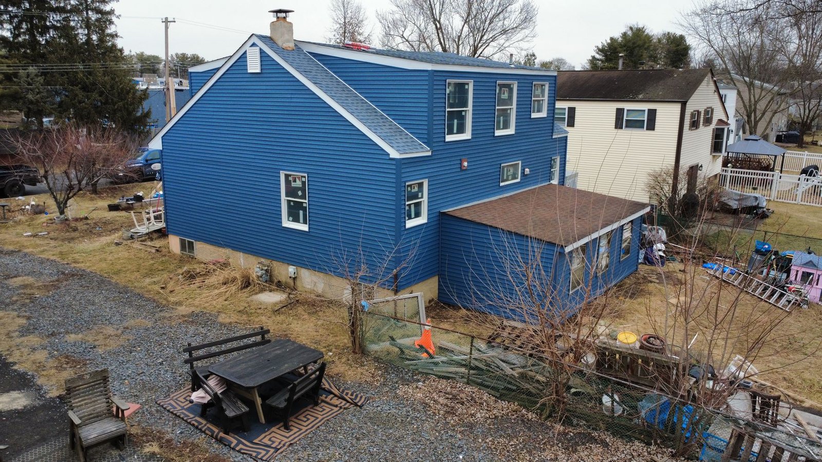 After — rear aerial of completed gambrel cape — Shelby Roofing Services NJ