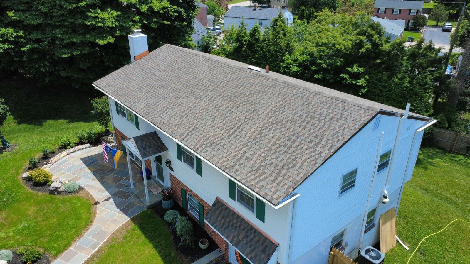 After — side aerial of completed split-level — Shelby Roofing Services PA