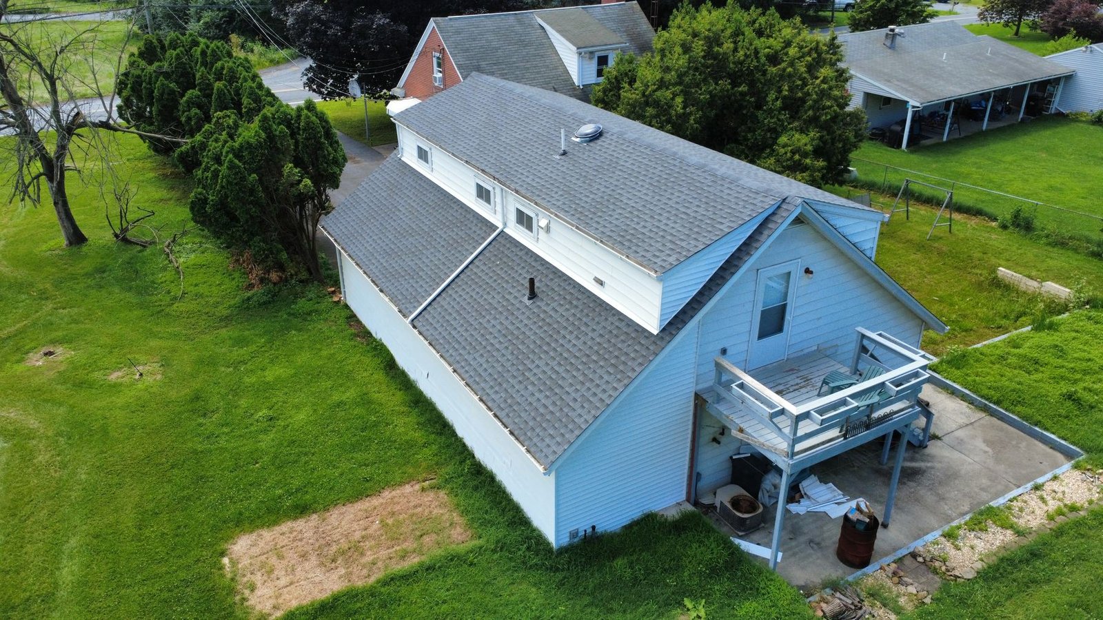 After — aerial view of completed white ranch — Shelby Roofing Services PA