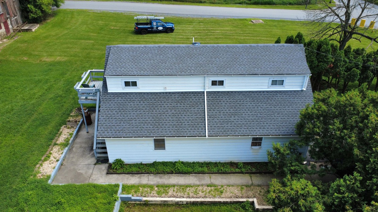 After — top-down aerial of completed ranch — Shelby Roofing Services PA