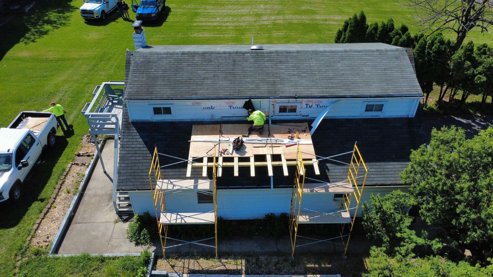 Before — aerial view of white ranch with old shingles, PA