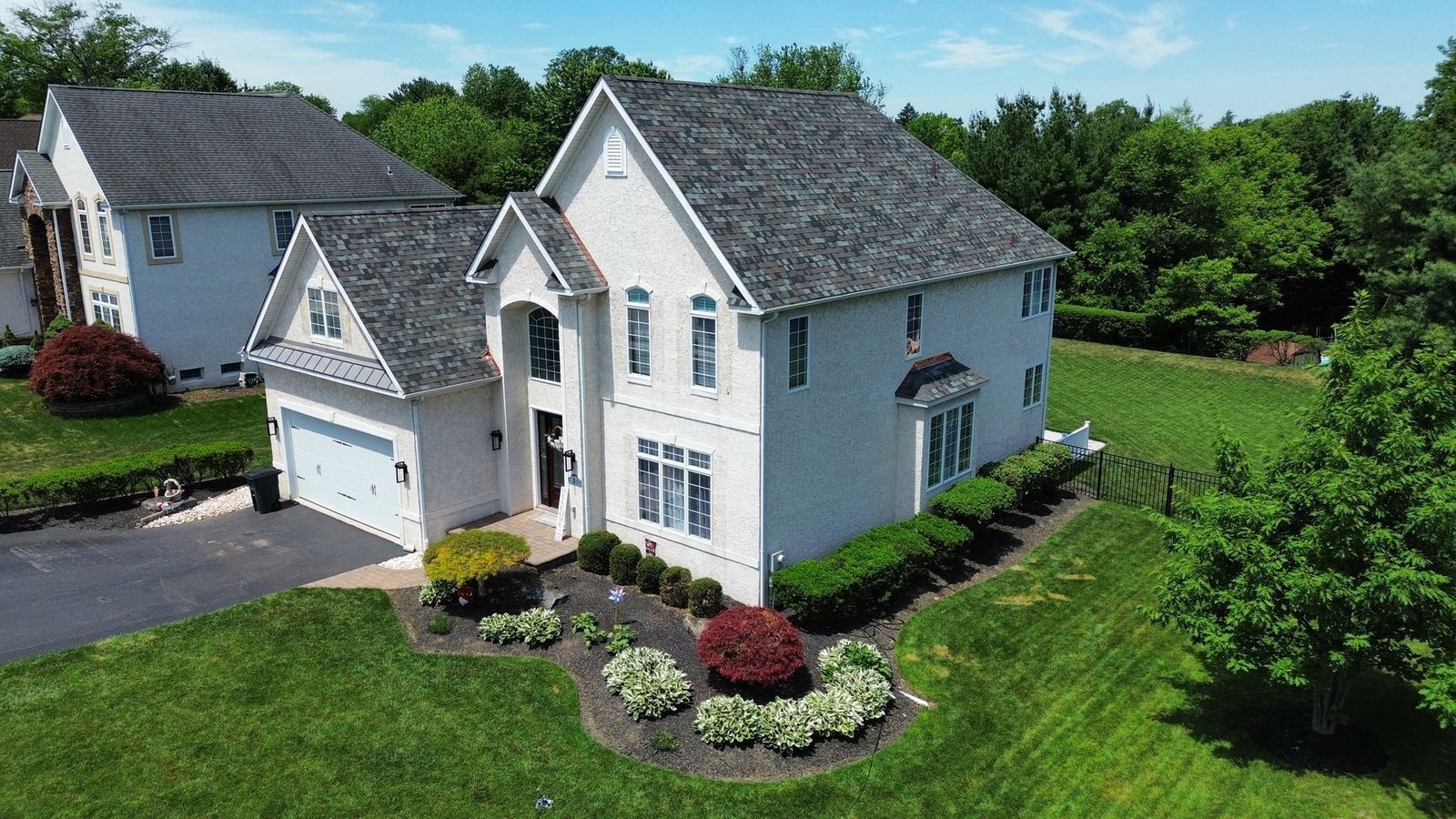 Front dormer detail with new architectural shingles and copper accents — Shelby Roofing Services PA