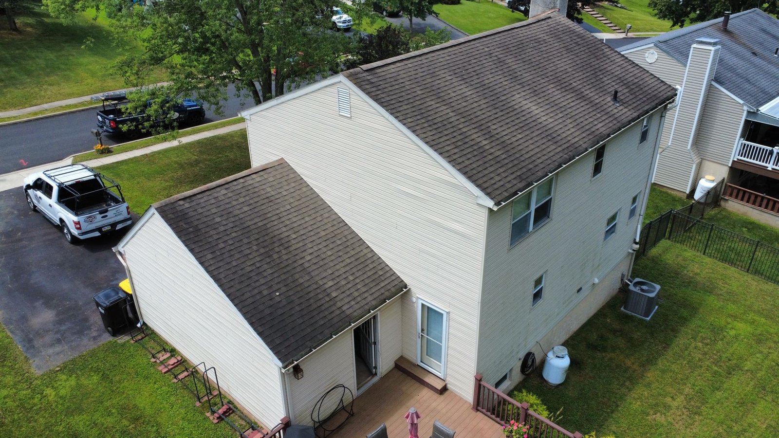 Before — angled aerial of colonial with old shingles, PA