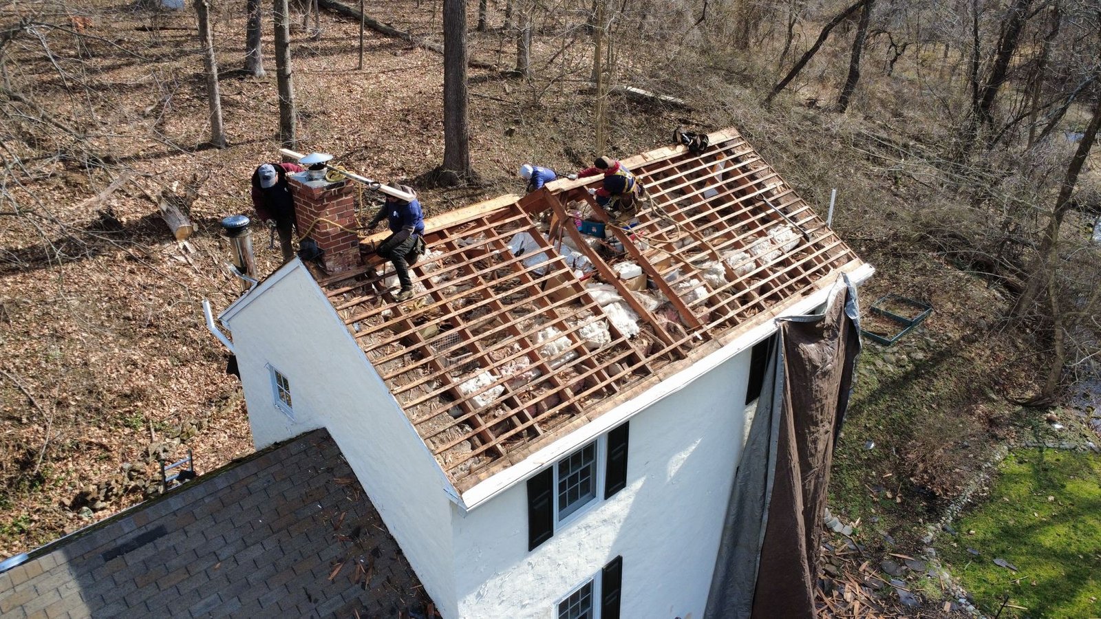 In-progress — shingle tear-off on white cottage, PA