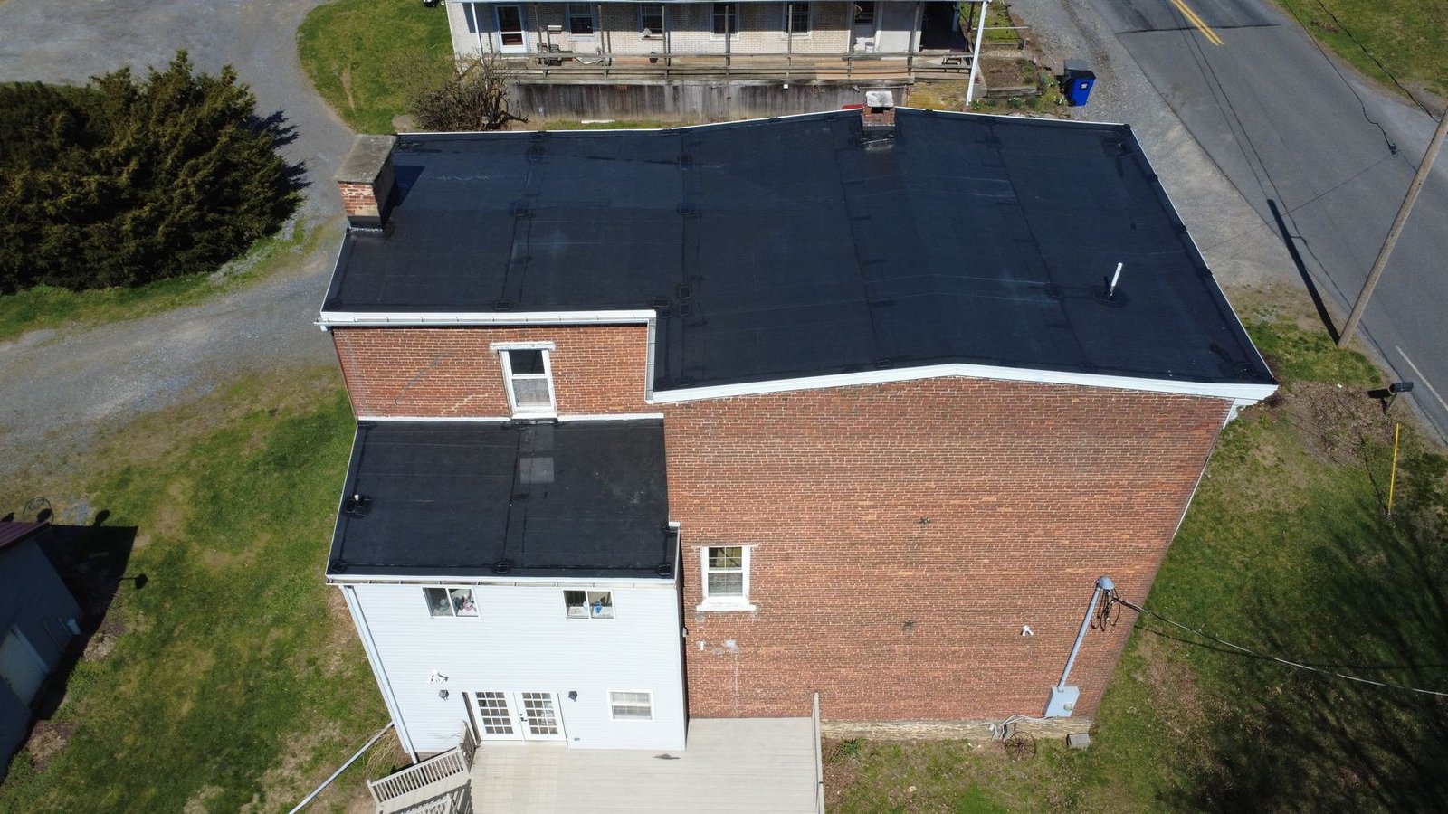 After — aerial of completed historic building with new flat roof — Shelby Roofing Services PA