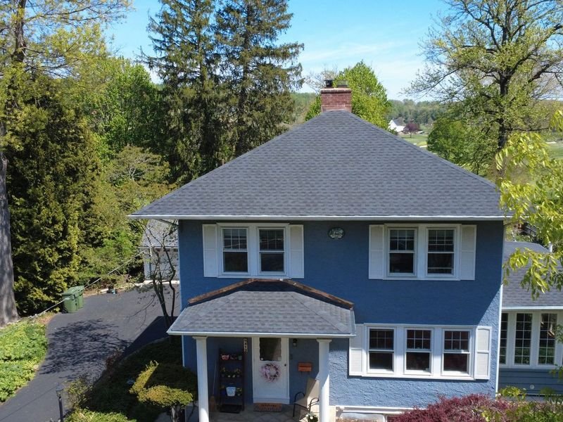 Blue colonial in the Oreland section of Upper Dublin Township with a new shingle roof and copper chimney flashing — Shelby Roofing Services