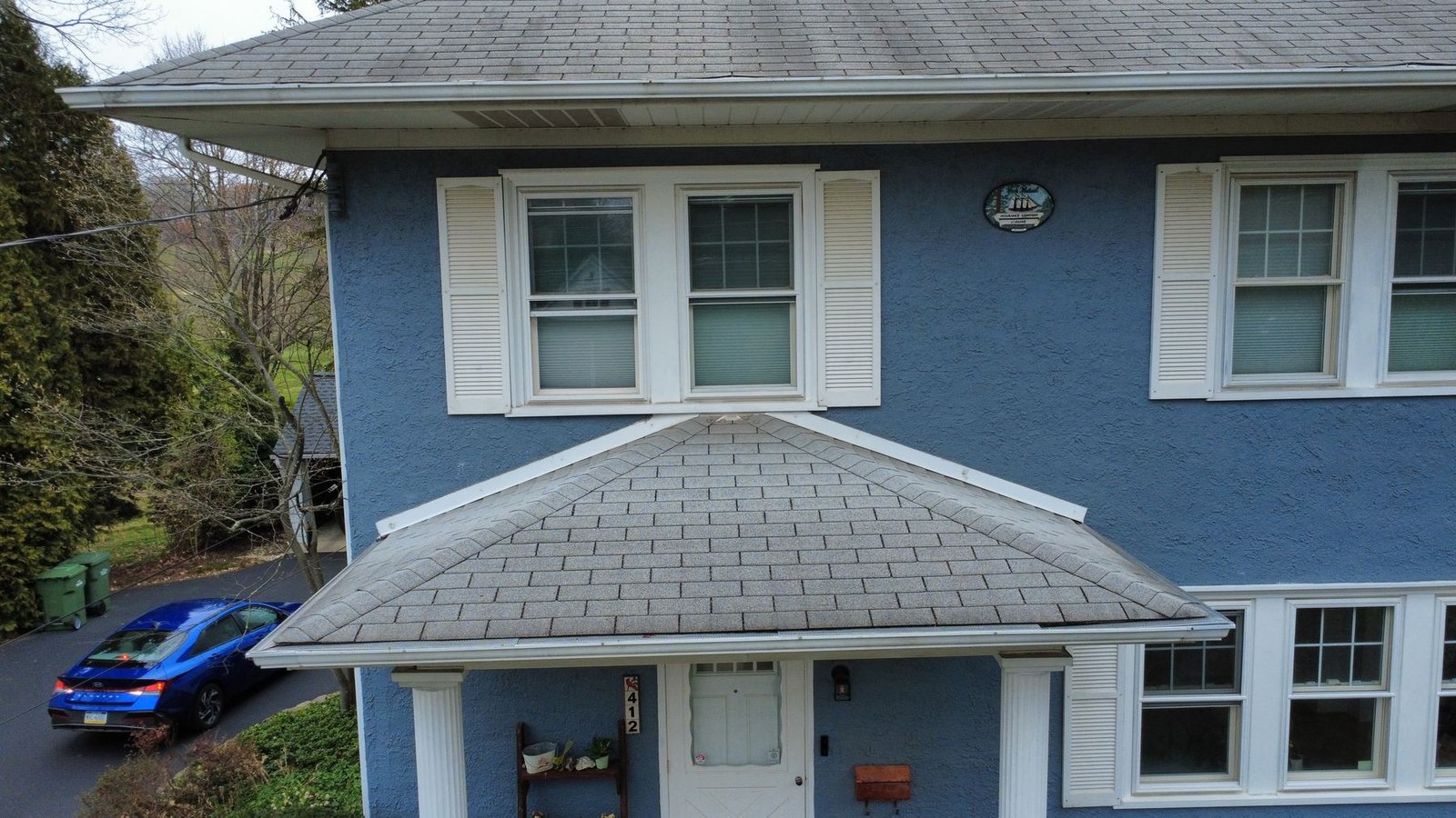 Before — top-down aerial of blue colonial with old weathered shingles, PA