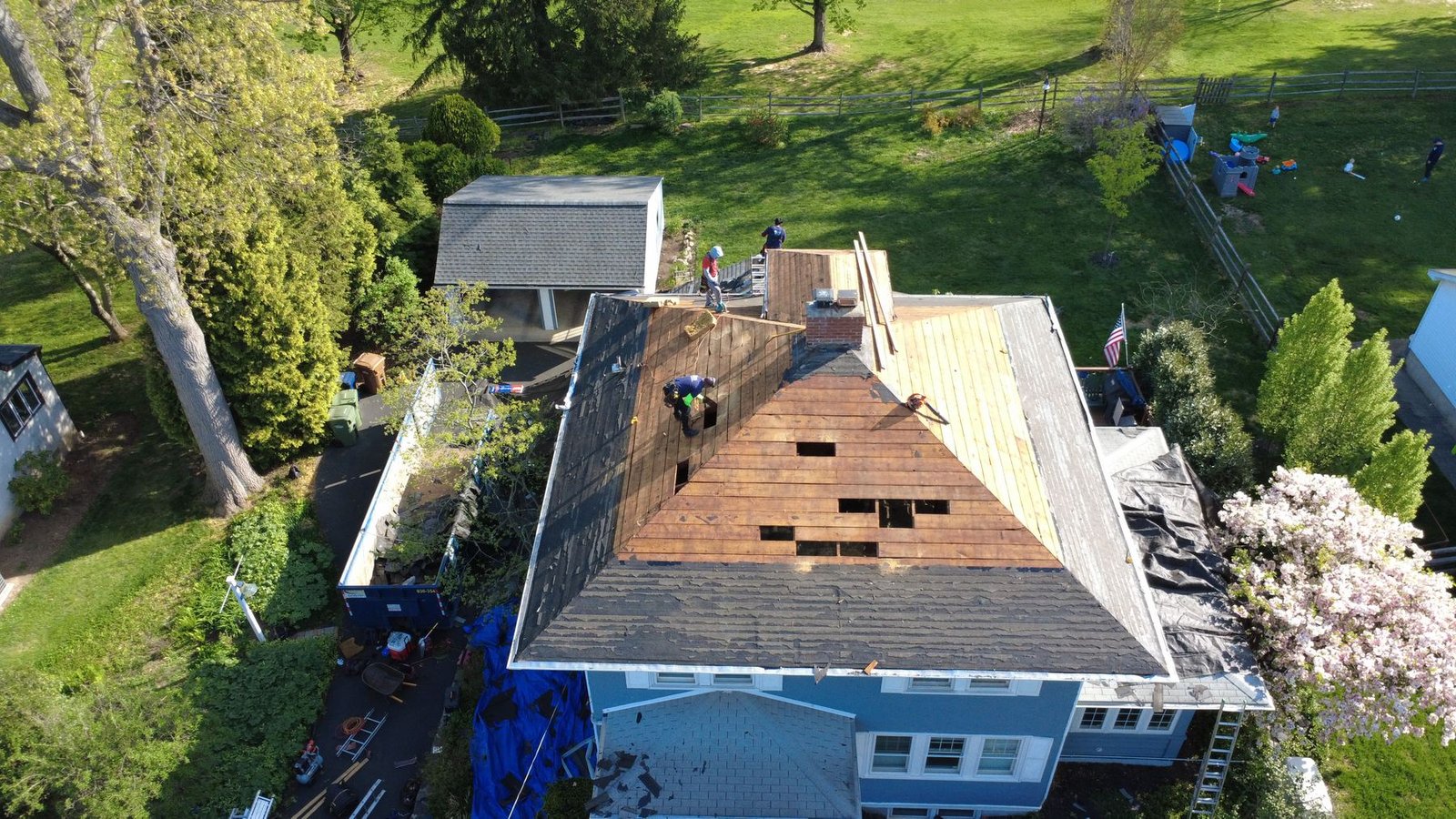 In-progress — full tear-off underway on blue colonial, PA