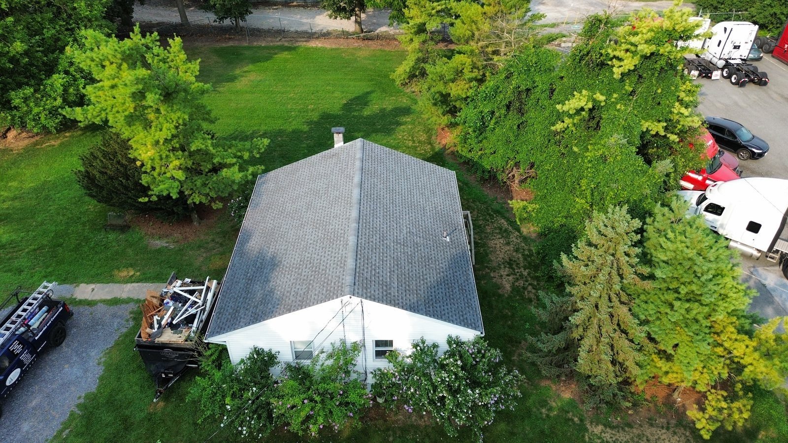 After — aerial angled view of completed roof with new gray shingles, PA