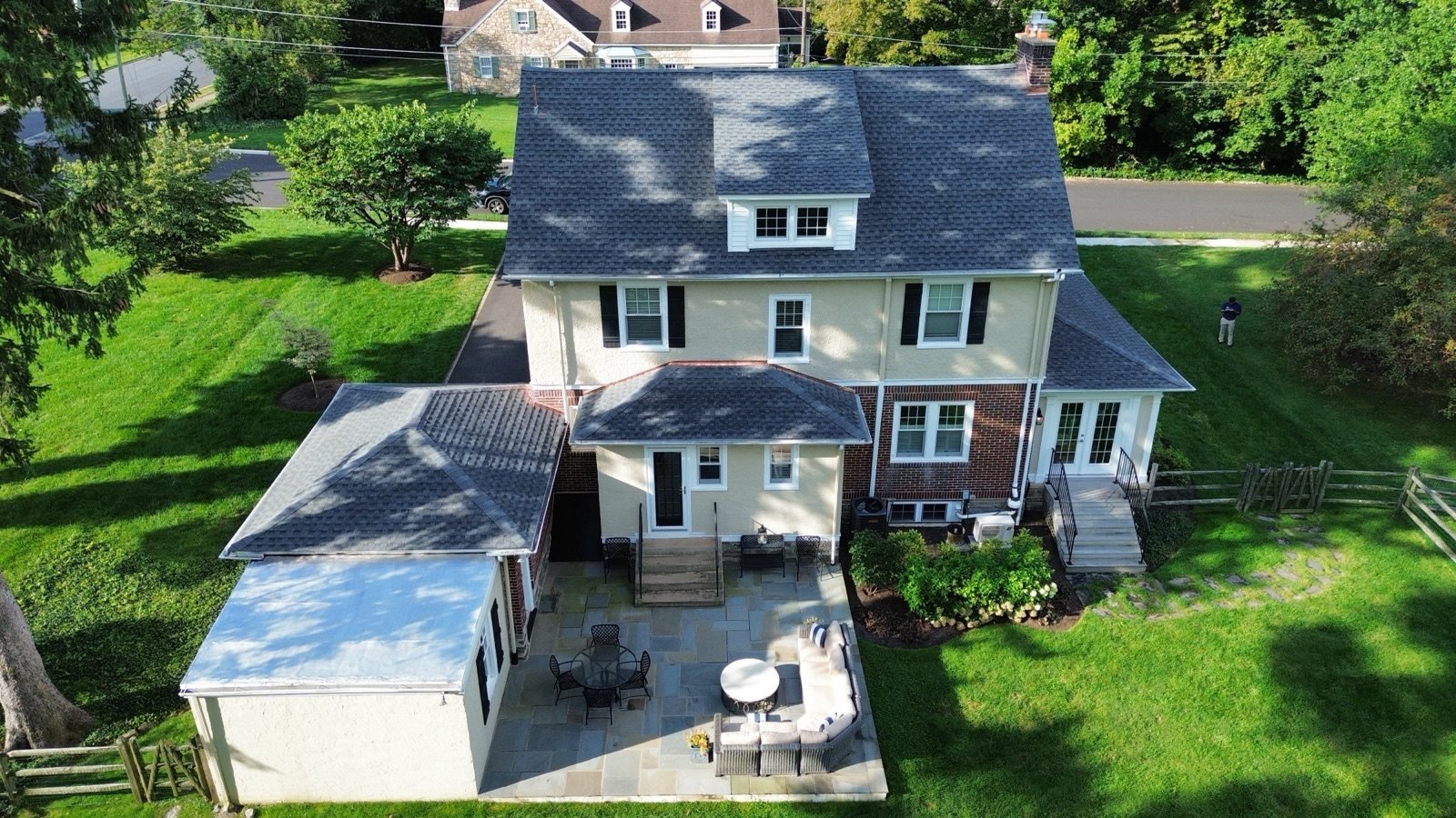 After — rear aerial of completed new roof over main house and rear entry — Shelby Roofing Services PA
