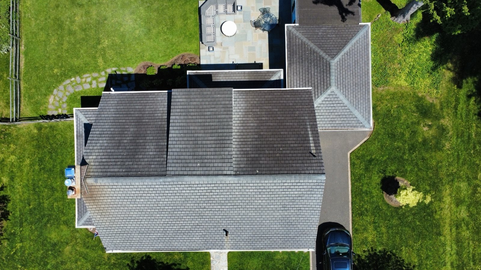 Before — top-down aerial of colonial with aged, weathered shingle roof, PA