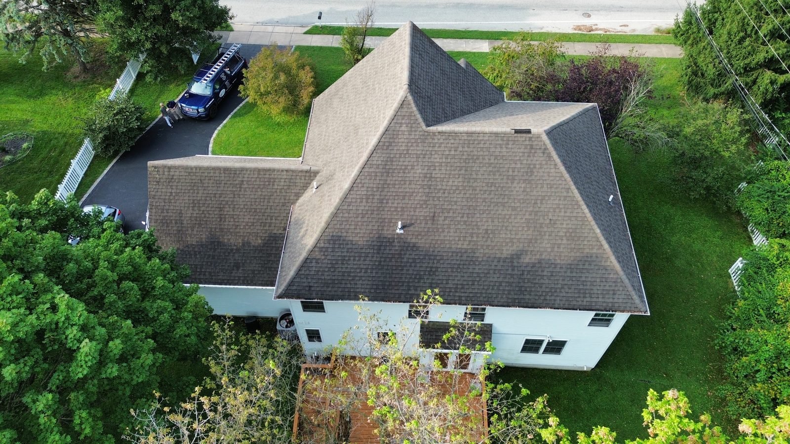 Before — rear aerial of the original brown shingle roof over the main house and garage, Plymouth Meeting PA