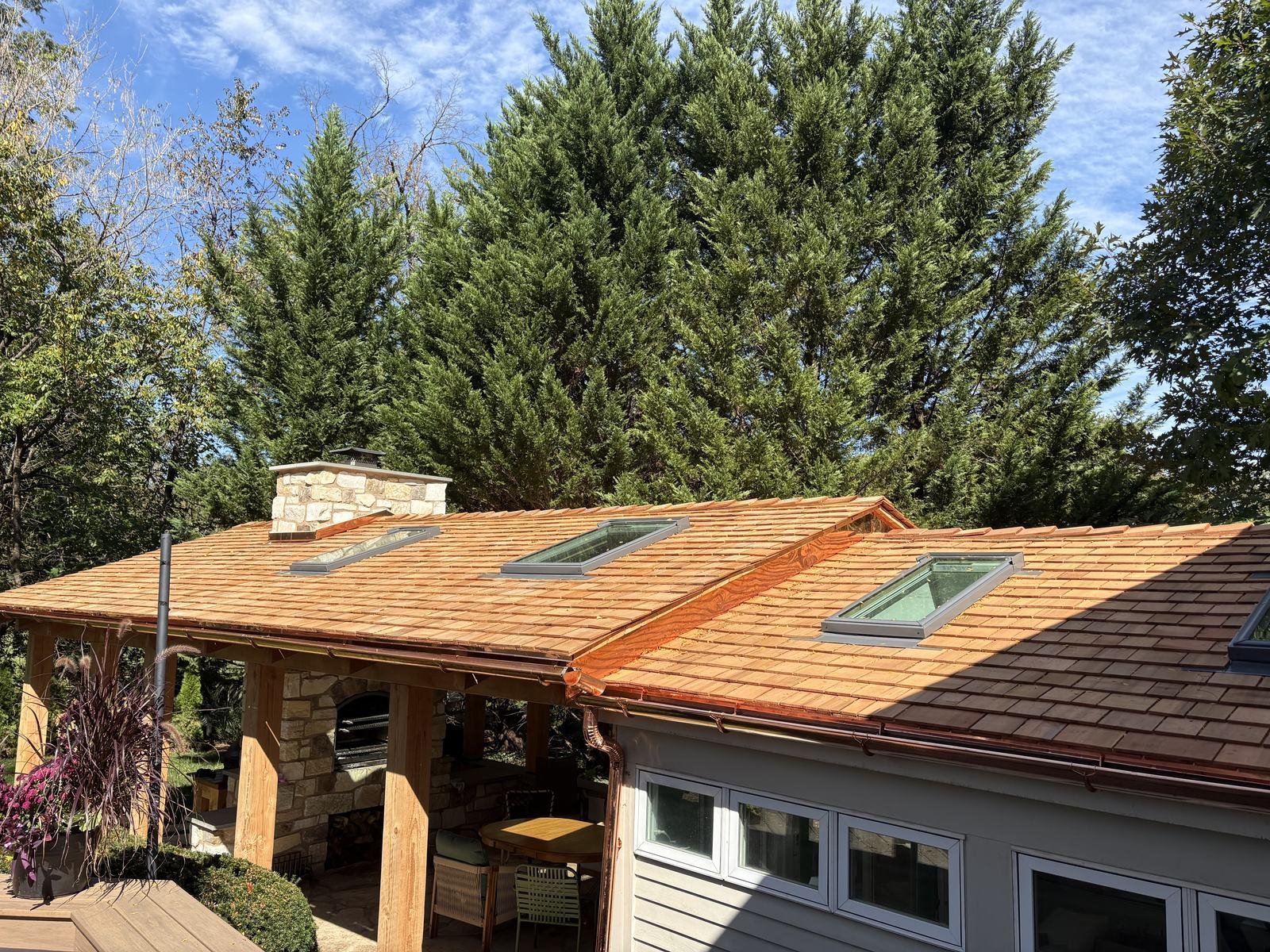 Cedar shake porch and sunroom with skylights and half-round copper gutters, Bryn Athyn, PA, by Shelby Roofing Services