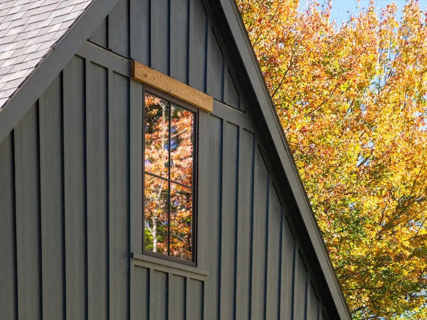 James Hardie board and batten siding on A-frame home — Shelby Roofing Services